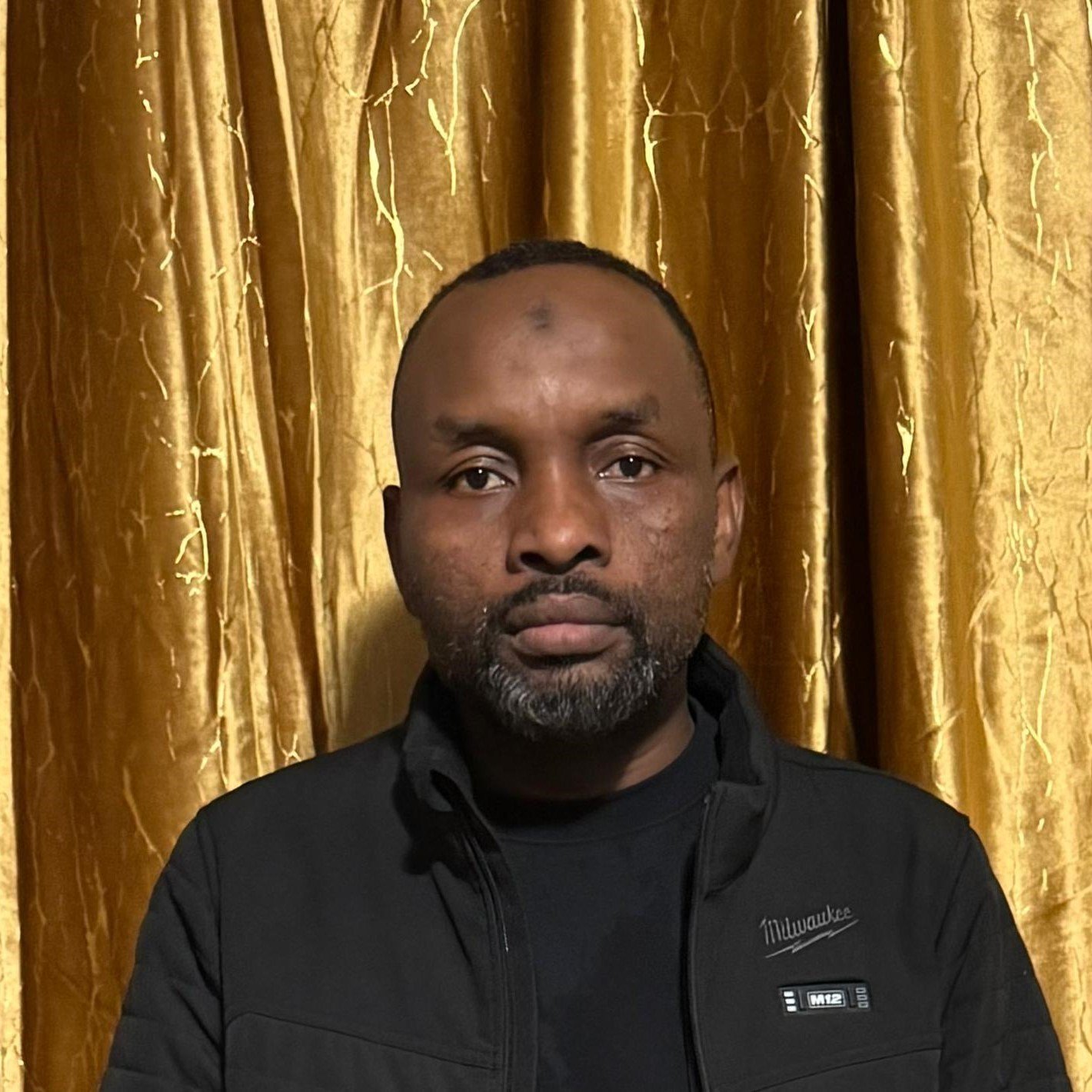 Assistant Treasurer Adan Mohamed